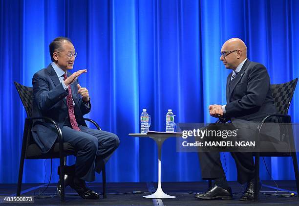 World Bank President Jim Yong Kim participates in a conversation with Al Jazeera America host Ali Velshi in the Preston Auditorium of the World Bank...