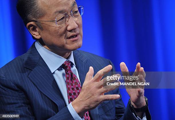 World Bank President Jim Yong Kim participates in a conversation with Al Jazeera America host Ali Velshi in the Preston Auditorium of the World Bank...