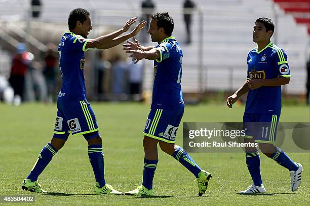 Carlos Lobaton of Sporting Cristal celebrates after scoring the third goal of his team against Real Garcilaso during a match between Real Garcilaso...