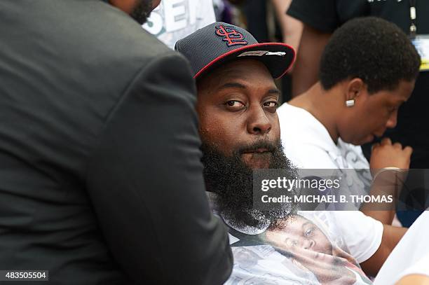 Michael Brown Sr., father of slain 18-year-old Michael Brown Jr. Attends a memorial service for his son on August 9, 2015 at the Canfield Apartments...