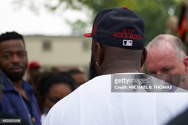 Michael Brown Sr., father of slain 18-year-old Michael Brown Jr. Attends a memorial service for his son on August 9, 2015 at the Canfield Apartments...