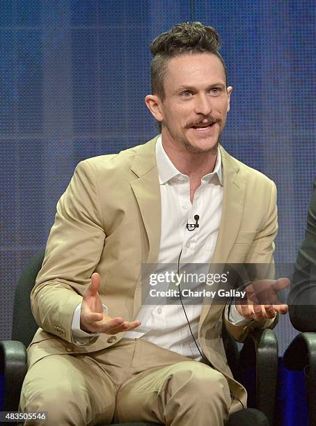 Actor Jonathan Tucker speaks onstage during the DIRECTV's presentation of KINGDOM at the 2015 Summer TCA Press Tour at The Beverly Hilton Hotel on...