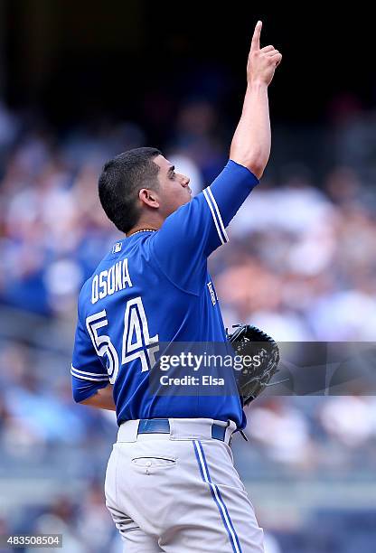 Roberto Osuna of the Toronto Blue Jays celebrates the 2-1 win over the New York Yankees on August 9, 2015 at Yankee Stadium in the Bronx borough of...