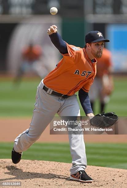 Collin McHugh of the Houston Astros pitches against the Oakland Athletics in the bottom of the first inning at O.co Coliseum on August 8, 2015 in...