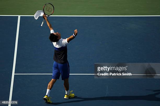 Kei Nishikori of Japan celebrates after defeating John Isner of the United States in the men's singles final during the Citi Open at Rock Creek Park...