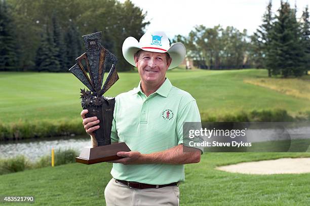 Jeff Maggert holds the trophy after winning the Shaw Charity Classic at the Canyon Meadows Golf & Country Club on August 09, 2015 in Calgary, Canada.