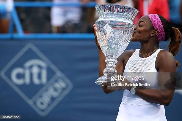 Sloane Stephens of the United States kisses the trophy after defeating Anastasia Pavlyuchenkova of Russia in the women's singles final during the...