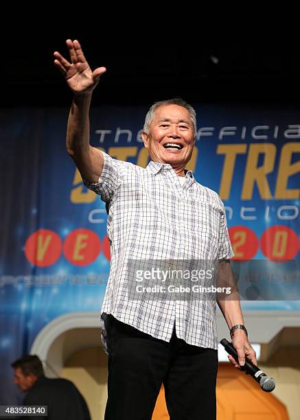 Actor George Takei extends his arm with a "live long and prosper" gesture from the "Star Trek" television franchise as he speaks during the 14th...