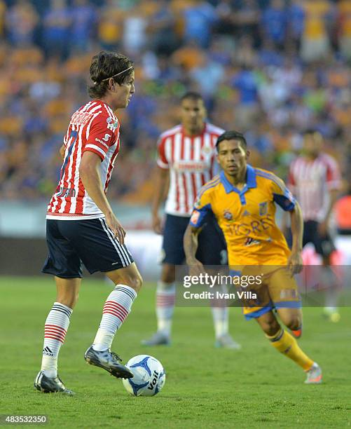 Carlos Fierro of Chivas drives the ball during a 3rd round match between Tigres UANL and Chivas as part of the Apertura 2015 Liga MX at Jalisco...
