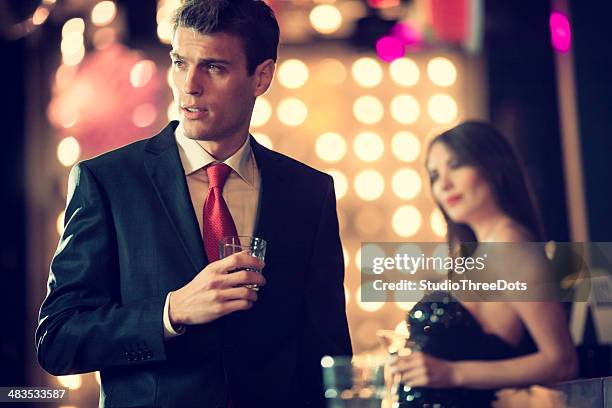 young man in a night club - black tie event stock pictures, royalty-free photos & images