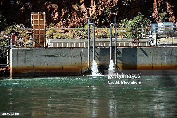 Water flows from the outlet station of the Ord River hydro power plant, operated by Pacific Hydro Pty, at Lake Argyle, 70 kilometers south of...