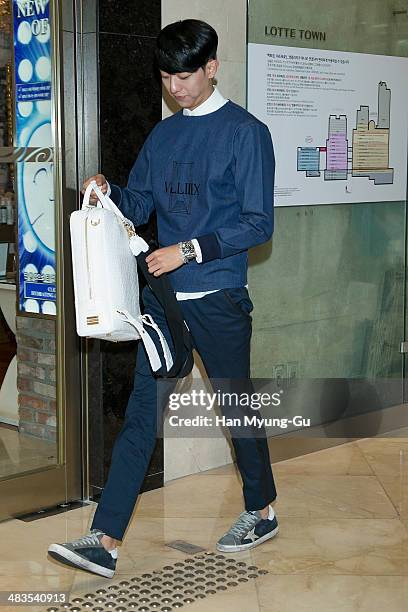 Kang Min-Hyuk of South Korean boy band CNBLUE attends the "Helianthus" 2014 S/S Lesley Line Launch event at Lotte Department Store on April 9, 2014...