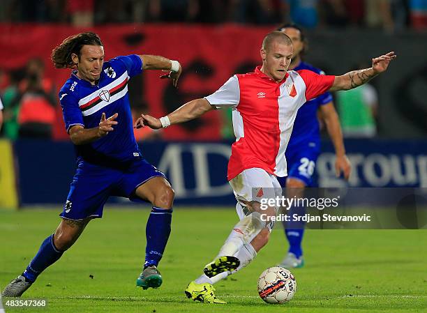 Ognjen Ozegovic of Vojvodina Novi Sad in action against Edgar Barreto of Sampdoria during the UEFA Europa League Third Qualifying Round 2nd Leg match...