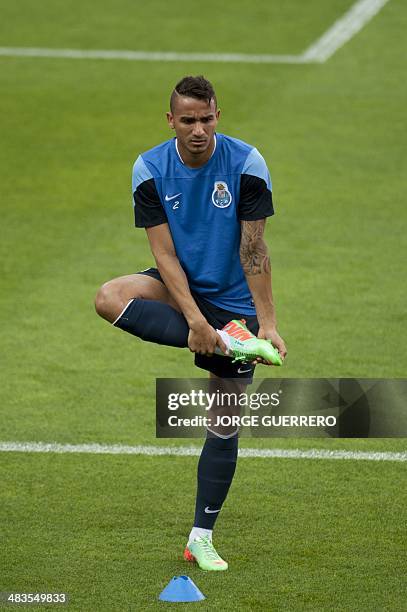 Porto's Brazilian defender Danilo stetches during a training session at the Ramon Sanchez Pizjuan stadium in Sevilla on April 9 on the eve of the...