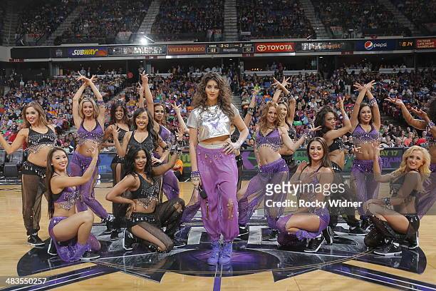 The daughter of Sacramento Kings owner Vivek Ranadive, Anjali Ranadive, entertains the fans with the Sacramento Kings dance team during halftime of...