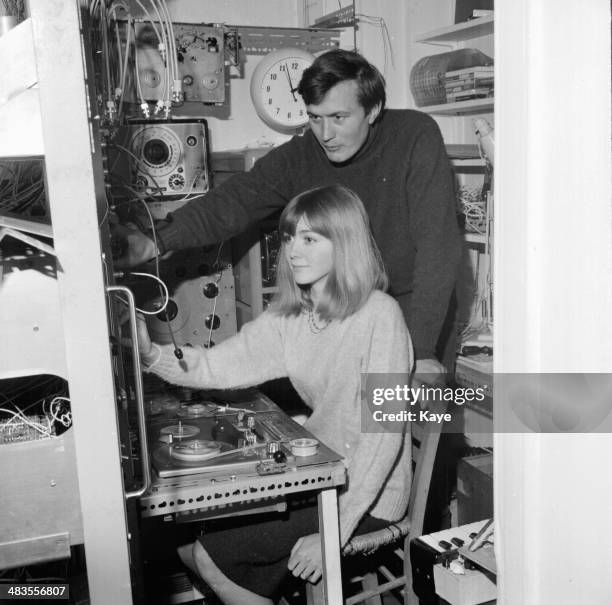 Inventor Peter Zinovieff and his wife, working on a synthesizer in his office, England, November 13th 1963.
