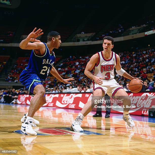 Drazen Petrovic of the New Jersey Nets handles the ball against the Dallas Mavericks circa 1991 at Brendan Byrne Arena in East Rutherford, NJ. NOTE...