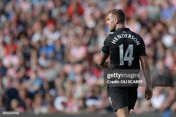 Liverpool's English midfielder Jordan Henderson looks on during the English Premier League football match between Stoke City and Liverpool at the...