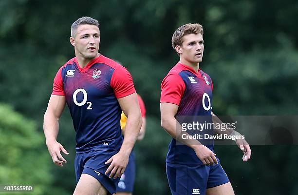 New caps, Sam Burgess and Henry Slade, who have been selected as centres for England in the match against France on Saturday, look on during the...