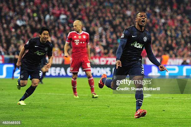 Patrice Evra of Manchester United celebrates his goal during the UEFA Champions League Quarter Final second leg match between FC Bayern Muenchen and...