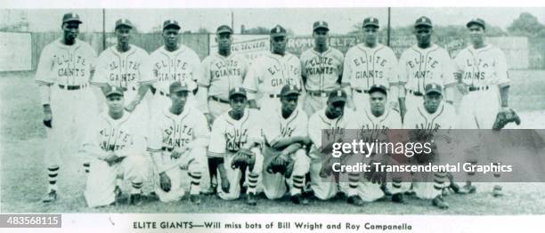 Catcher Roy Campanella poses with the Elite Giants Baseball club of the National Negro Leagues in 1946 in Baltimore, Maryland.