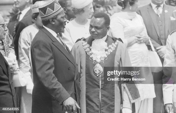 Kenyan leader Jomo Kenyatta and politician Tom Mboya, during a celebration of Kenyan Independence, 1963.