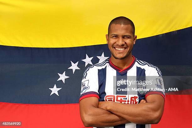In this image released on August 10 Jose Salomon Rondon poses with the flag of Venezuela as he is unveiled by West Bromwich Albion at West Bromwich...