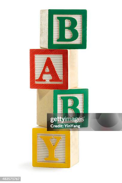 “baby” spelled in stacked alphabet toy blocks, for learning, playing - block shape stock pictures, royalty-free photos & images