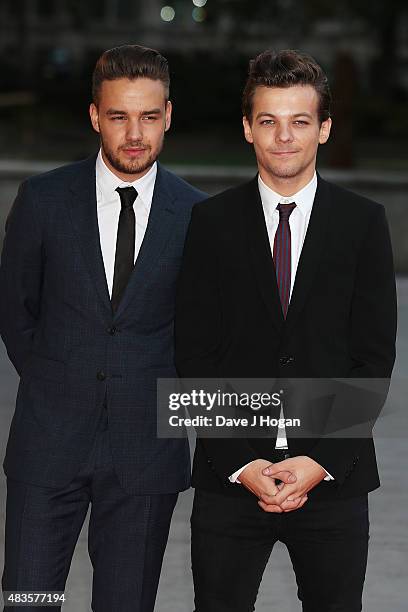 Louis Tomlinson and Liam Payne attend the Believe in Magic Cinderella Ball at the Natural History Museum on August 10, 2015 in London, England.