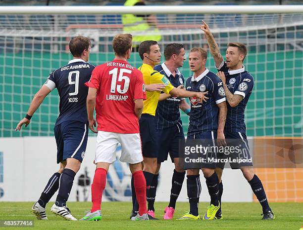 Fabian Klos, Sebastian Langkamp of Hertha BSC, Christian Mueller, Christoph Hemlein and Manuel Jungglas of Arminia Bielefeld during the match between...