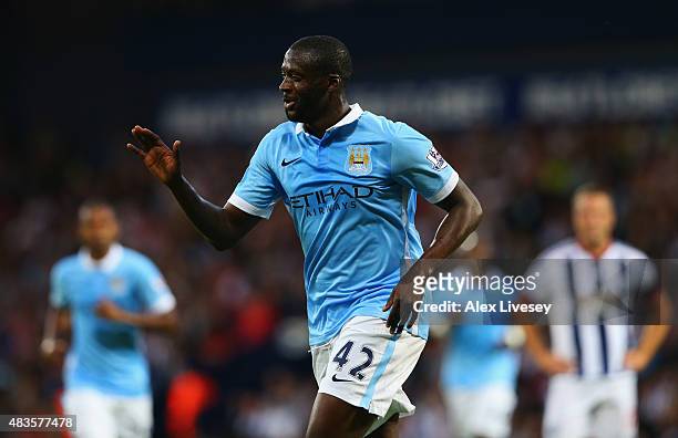 Yaya Toure of Manchester City celebrates as he scores their second goal during the Barclays Premier League match between West Bromwich Albion and...