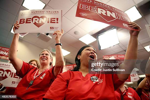 Nurses with the National Nurses United cheer as Independent presidential candidate U.S. Sen. Bernie Sanders speaks during the "Brunch with Bernie"...