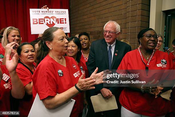 Independent presidential candidate U.S. Sen. Bernie Sanders greets nurses as he arrives at a "Brunch with Bernie" campaign rally at the National...