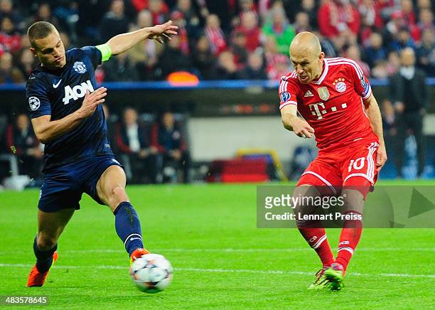 Arjen Robben of Muenchen scores his teams third goal during the UEFA Champions League quarter-final second leg match between FC Bayern Muenchen and...