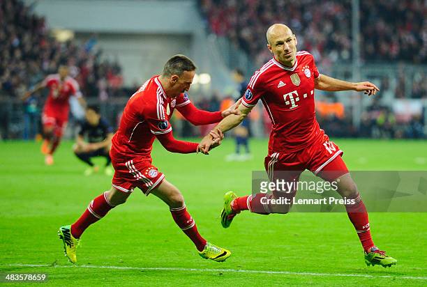 Arjen Robben and Franck Ribery of Muenchen celebrate their third goal during the UEFA Champions League quarter-final second leg match between FC...
