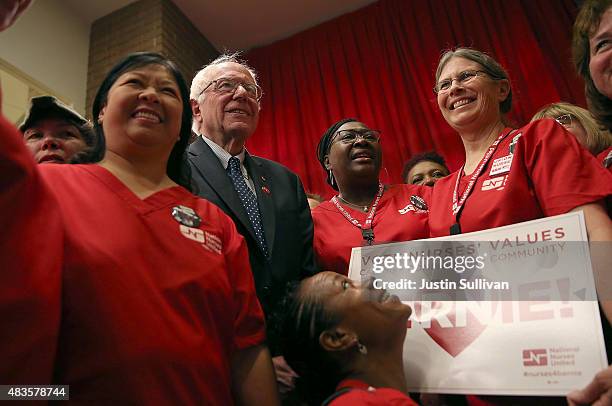 Independent presidential candidate U.S. Sen. Bernie Sanders poses for a photo with nurses as he arrives at a "Brunch with Bernie" campaign rally at...
