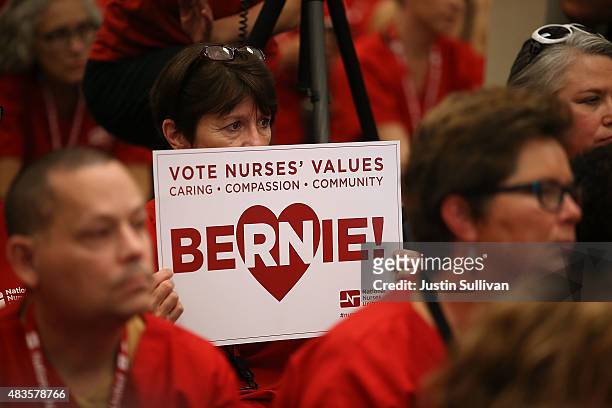 Nurse with the National Nurses United holds a campaign sign as Independent presidential candidate U.S. Sen. Bernie Sanders speaks during the "Brunch...