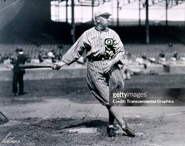 Eddie Collins of the White Sox takes batting practice before a game in 1917 in Comiskey Park in Chicago, Illinois.