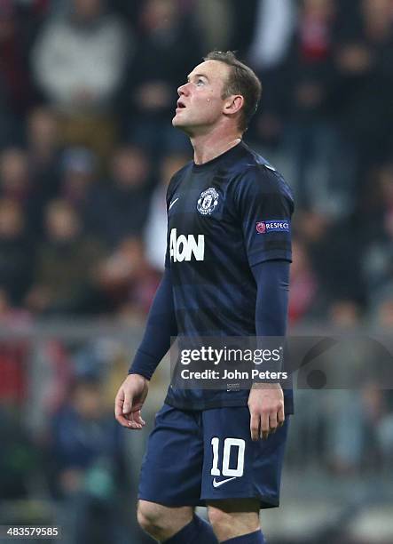 Wayne Rooney of Manchester United shows his disappointment during the UEFA Champions League quarter-final second leg match between Bayern Munich and...