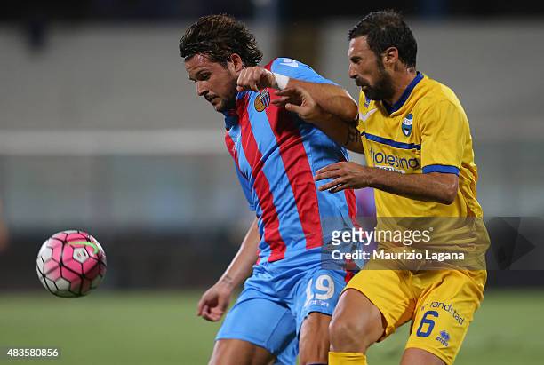 Riccardo Maniero of Catania competes for the ball with Stefano Cottafava of Spal during the TIM Cup match between Calcio Catania and Spal at Stadio...