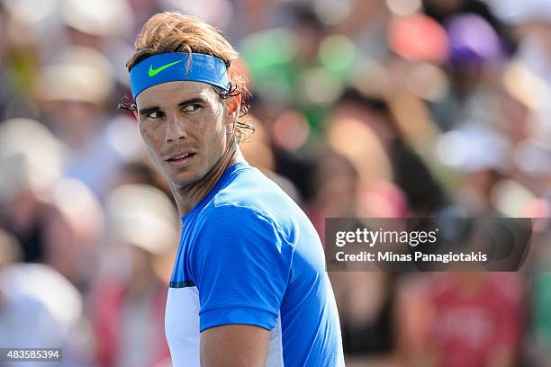 Rafael Nadal of Spain looks on during day one of the Rogers Cup at Uniprix Stadium in his doubles match against Tomas Berdych of the Czech Republic...