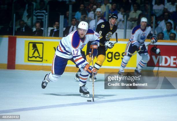 Jari Kurri of the Edmonton Oilers skates with the puck during the 1988 Stanley Cup Finals against the Boston Bruins in May, 1988 at the Northlands...