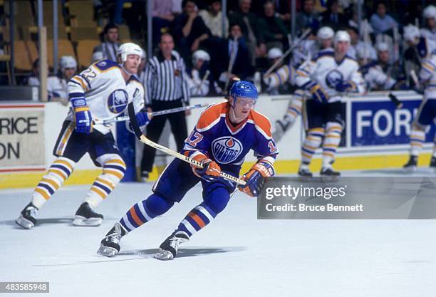 Jari Kurri of the Edmonton Oilers skates on the ice during an NHL game against the Buffalo Sabres circa 1990 at the Buffalo Memorial Auditorium in...