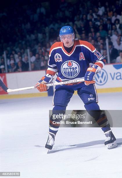 Jari Kurri of the Edmonton Oilers skates on the ice during the 1990 Stanley Cup Finals against the Boston Bruin in May, 1990 at the Boston Garden in...