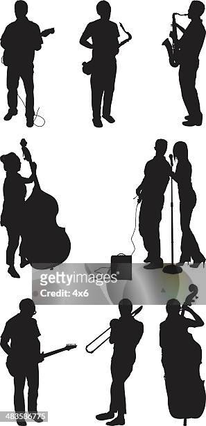 musical performers playing instruments - musician silhouette stock illustrations