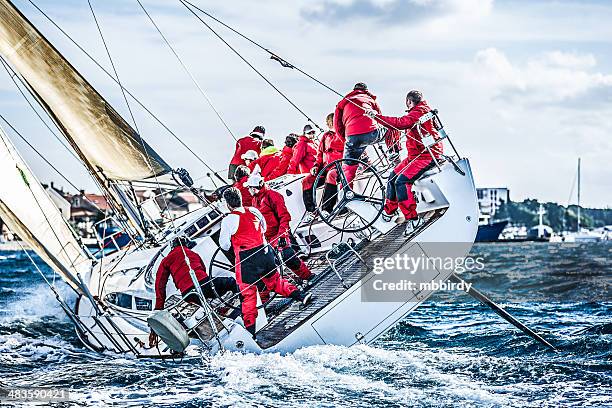 sailing crew on sailboat during regatta - ship crew stock pictures, royalty-free photos & images