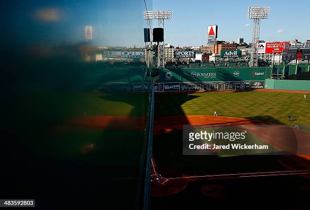 General view as Jake Peavy of the Boston Red Sox pitches to Prince Fielder of the Texas Rangers at Fenway Park on April 9, 2014 in Boston,...