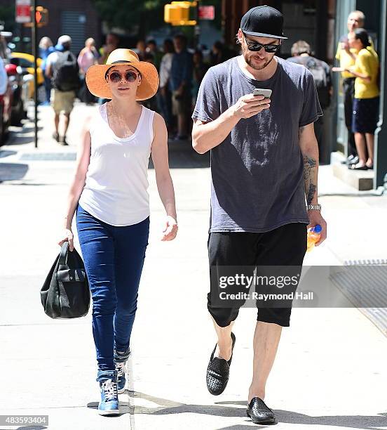 Actress Rose McGowan and husband Davey Detail are seen walking in Soho on August 10, 2015 in New York City.