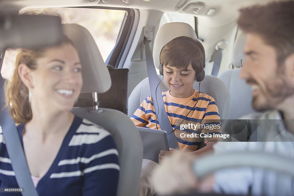 Happy family inside car