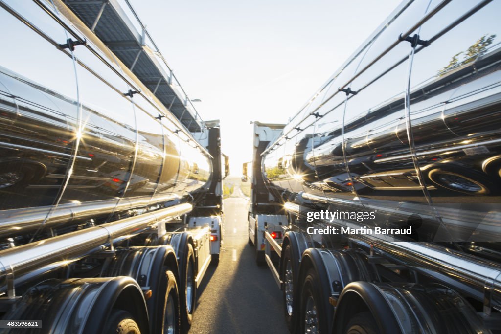 Stainless steel milk tankers side by side